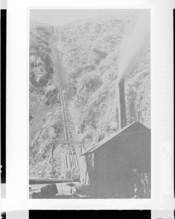The tramway being moved during the construction of Santa Ana River #1 Hydro Plant so that the penstock and pipes could be installed