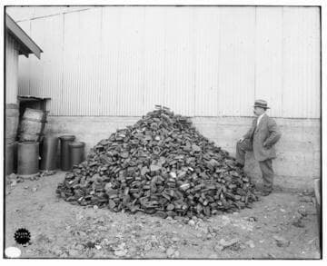 Edison Scrap Drives - Junk Sad Irons [pile of old non-electric irons]