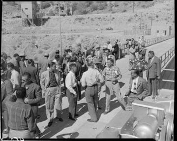 Crowd of people on the crest of Dam 7 touring the dam probably during the dedication of the Big Creek 4 project