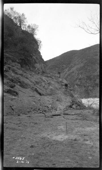 Men constructing new road into Santa Ana Canyon after floods
