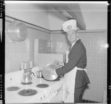 Man cooking on electric stove