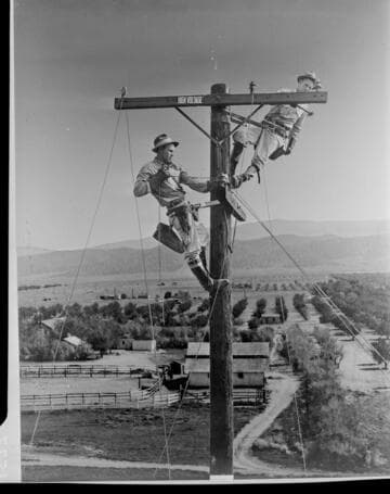 Electrical Times cover: composite photo of linemen on pole
