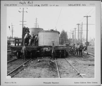 220kV transformer for Eagle Rock Substation on railroad car being transferred to another flat car