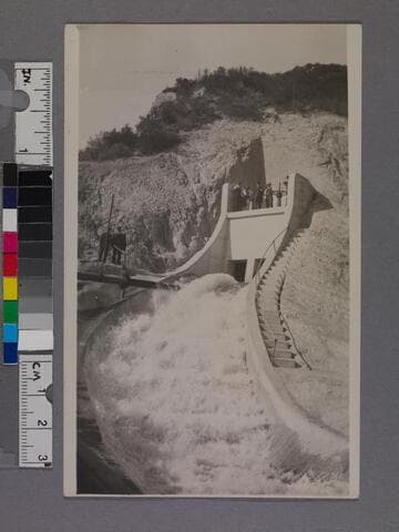 Men at the wheels opening Los Angeles Aqueduct at Sylmar Gates