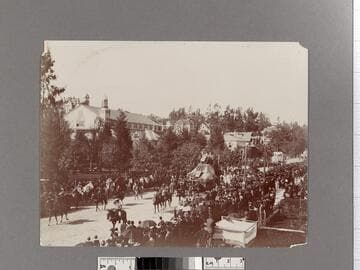 Parade with mountain railway float on Hill Street, Los Angeles