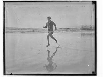 Lily May Bowmer jogging on the beach near Santa Monica Pier, California