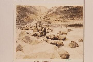 The Dusty Dozen lining Soap Creek Rapid with cinematographer Fred. C. Jayne in the skiff