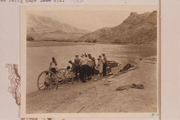 Launching and loading skiffs at Lees Ferry by Dusty Dozen.  Frank Swain at left and Frank Dodge with white cap and no shirt
