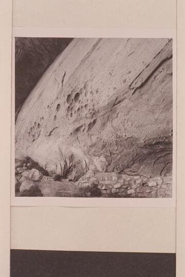 Pocking of rock face above spring at TSE AH TOH on the Rainbow Plateau