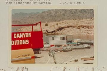 The Grand Canyon Expeditions deflates its baloneys and loads the truck at South Cove.  Jim Jordan's houseboat is center