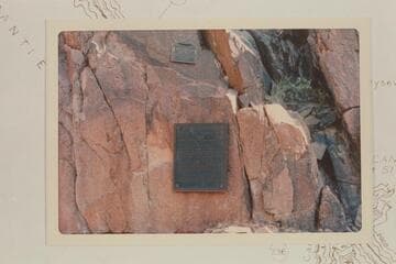 The plaque at Separation Rapid placed first near the edge of the river and removed--1934-1939, and the plaque to replace it which was placed in 1939 by Julius Stone and party.  The first plaque was placed a second time 1971, Nov. 27