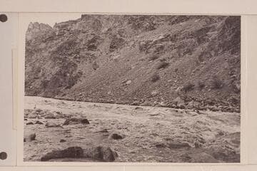 Boat action in Hermit Rapid.  Claude appears to be pilot and Belknap passenger.  Ed Ralph is on the shore at extreme right