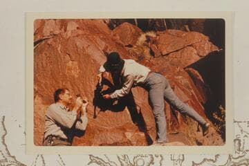 Jim Bailey and Frankie Strathairn drilling the holes for replacing the 1934 plaque at Separation Canyon
