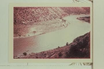 Down Desolation Canyon from top of talus at Mile 44.5.  The sadirons and camp 12 at lower left