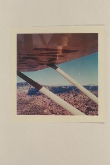 Up Navajo Valley to Fifty Mile Mountain; Sixty Mile Point runs out to the right and the Henry Mountains are on the skyline