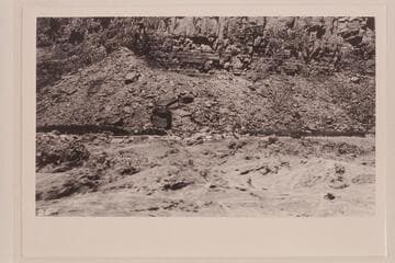 The boat "Glen" in Badger Creek Rapids. H. E. Blake, boatman