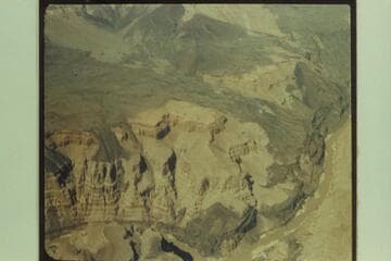 Lava flows from the Uinkaret Range.  The bend of the river at lower center is approximately Mile 183