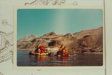 Floating on air mattresses below 222 Mile Creek which is directly above the head of Bill Mooz who is at right