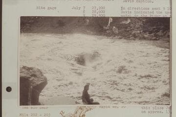 Fern Davis at the head of Rapid 22, Mile 202.4.  Early AM.  Davis caption:  "On right bank--early morning--Rapid #22--Eddy's book--Fern Davis--Boat was flipped over backwards on the run thru about 25 feet to the right of hole."