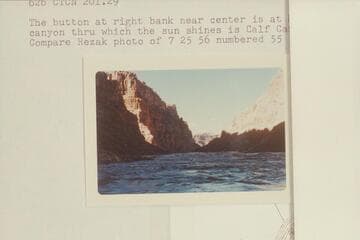 Upstream from below Rapid No. 23.  The button at right bank near center is at Mile 203.  The side canyon thru which the sun shines is Calf Canyon at Mile 202.75.  Compare Rezak photo of 7 25 56 numbered 55
