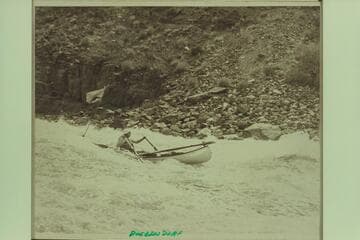 The canoe in Dubendorff Rapid.  Designed by Ron Smith, Glade Ross, Dee Halladay, and Dean Waterman.  Three units were built.  The first one probably built in 1965.  Dana Burden took this unit through the Grand Canyon in 1969