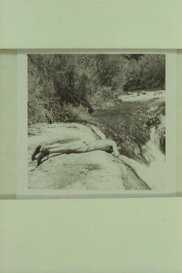 Bill Beer gets a drink from the creek