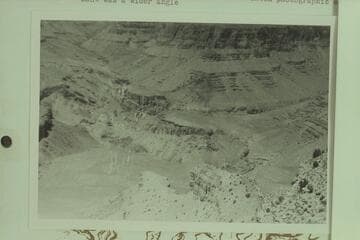 Crystal-Dragon junction from point where Stanton made his photo 354-486 1890, Feb. 10. Top of Redwall and below Supai cliff west of center of shoulder at north end of Ra