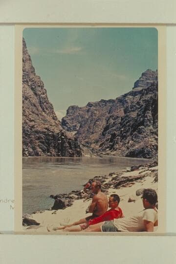 Noon rest while floating downriver at Mile 234.14 left bank