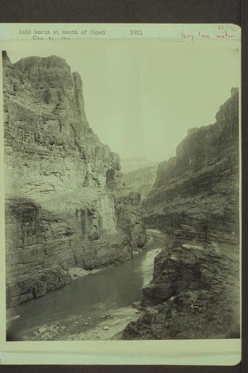 Kolb Bros.' boats at mouth of Havasupai River.  Very low water