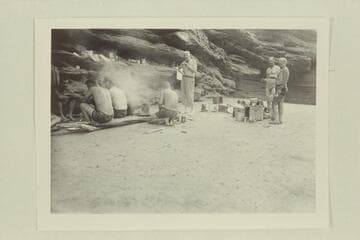 Joe Desloge standing center, MacDonald and Marston, right