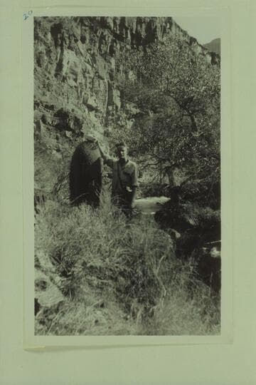 Blake and cactus.  Tapeats Creek in background, just above box canyon of Tapeats Creek and not far from the river
