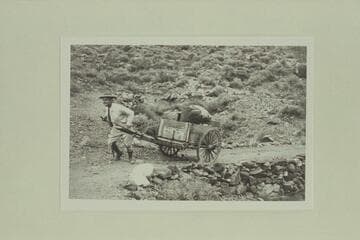 Johnny Maxson hauling dunnage from cable to cabins;  Hermit Camp