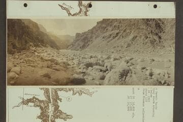 Down at Hermit Rapid.  Electrical storm crossing; Canyon below