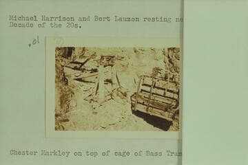 Michael Harrison and Bert Lauzon resting near the Bass Tram