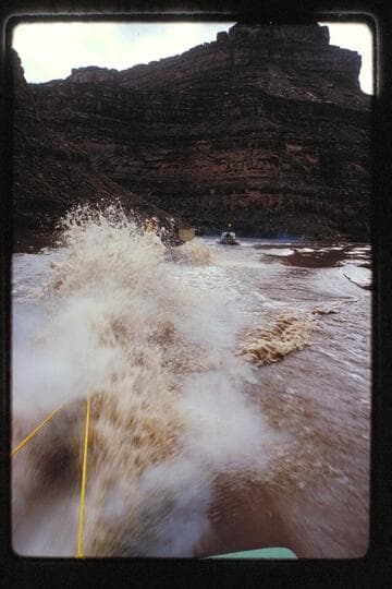 The "Bert Loper" gets an assist in towing crippled cruiser