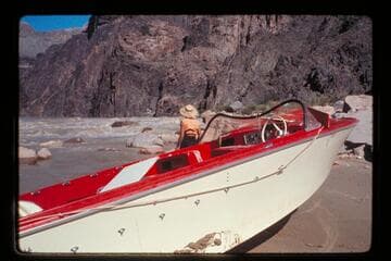"Wee Red" on beach; Monument Creek
