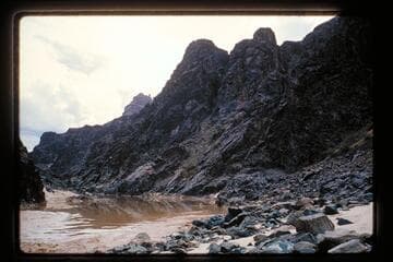 Up from beach at mouth of side canyon at Mile 234.2, left bank