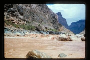 Belknap in Sportyak at foot of Vulcan Rapids