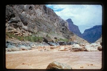 Belknap in Sportyak at foot of Vulcan Rapids