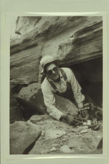 Bert Loper in Glen Canyon.  Boatman for Dave Rust's party of July, 1930, running from Hite to Lees Ferry.  A visit was made to the steps at El Vado