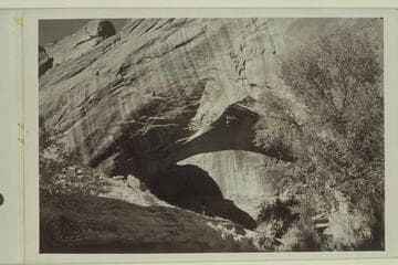 Natural bridge of Navajo sandstone, Willow Creek.  Span 185 feet, height to girder 76 feet