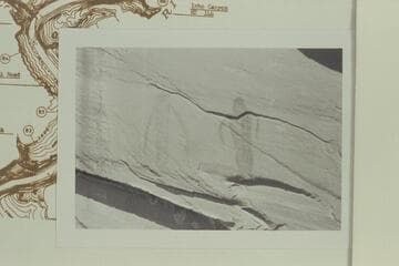 Inscriptions at right bank below Escalante River being submerged by Lake Powell