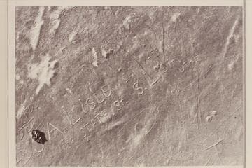 Inscription on huge rock in high cave west of Schock Trail, near Mile 111, north bank