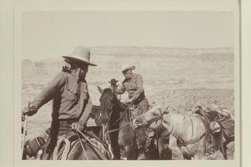 Buck Whitehat; Buster Ordiway; Archeyes Masland.  On the black brush mesa north of the northeast fork of 73.6 on ride into the middle fork.  Fifty Mile Mountain in background