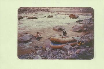 Dave lashing boats together at lower rapid of the "Big Drop", Mile 202, Cataract Canyon