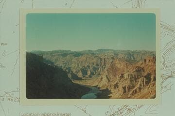 Down Cataract Canyon from about Mile 110 1/2 to Tilted Park with the mouths of Y and Cross Canyons left of center and the slump block at right
