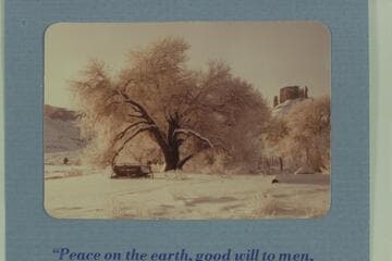 Christmas card from Bates and Robin:  Professor Valley Ranch, Christmas, 1976; [The old print keeps watch over us, so it's raising hay and very little cain.]