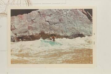 Jack Brennan driving boat in Cisco Bend