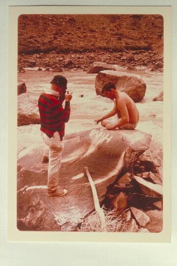 Dock Marston photographing the Harry McDonald and James Best inscriptions as Buzz Belknap marks them.  Mile 204 1/2 right bank