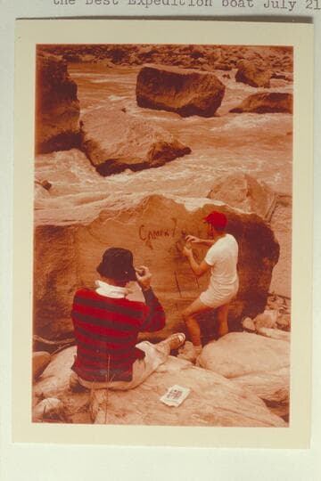 Jorgen Visbak wets the Best Expedition inscription at Mile 204 1/2 so Dock Marston can get a picture